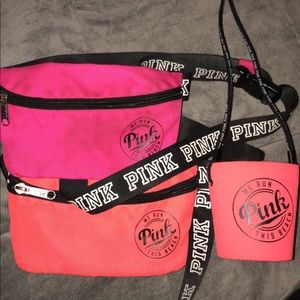 Two PINK fanny packs and a PINK koozie necklace